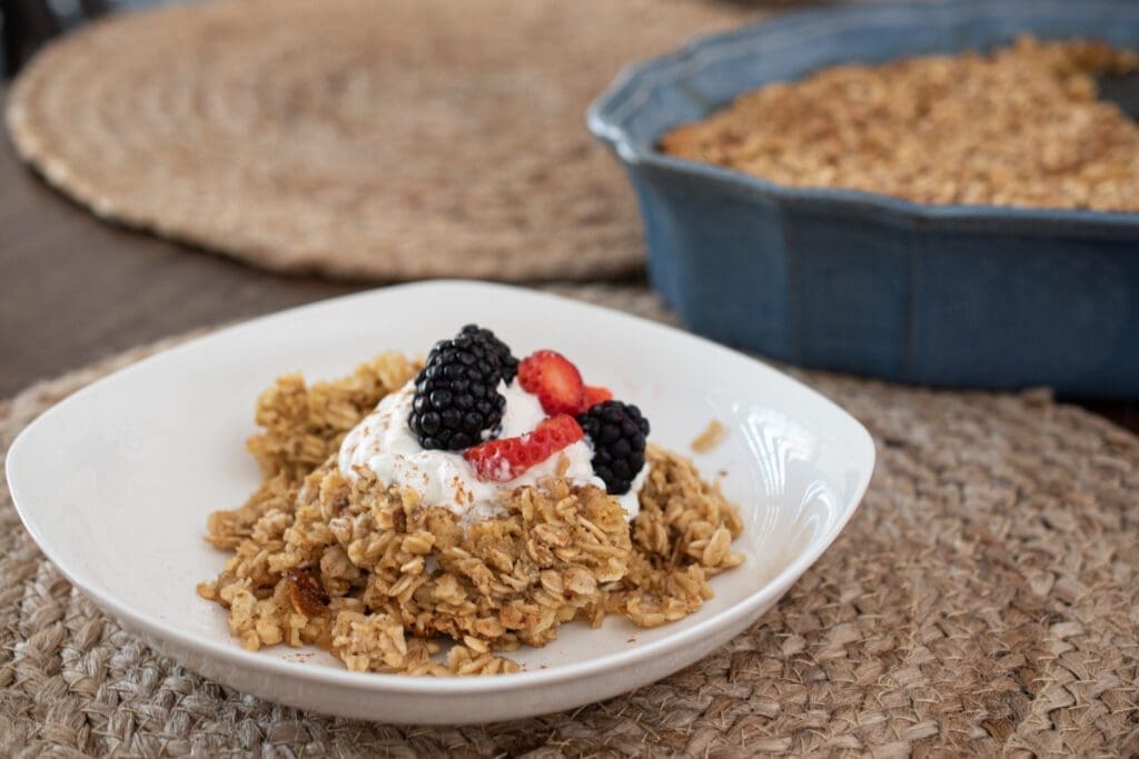 easy overnight oatmeal with maple cream and fresh berries