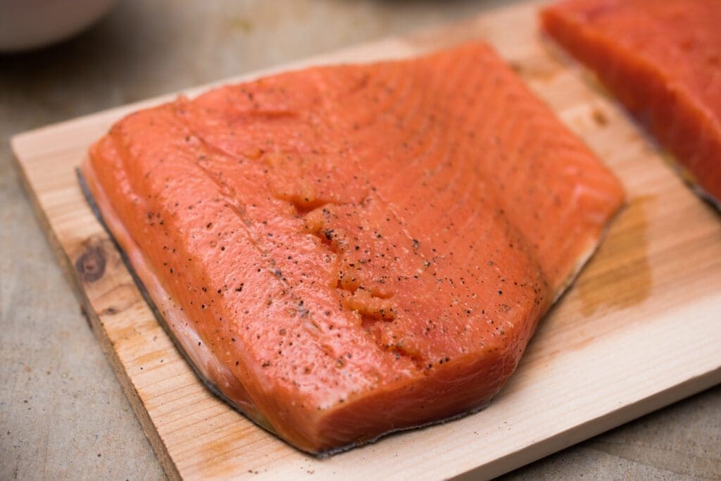 salt and pepper on salmon