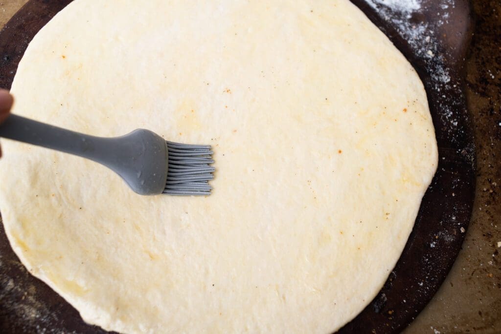 brush the crust with oil