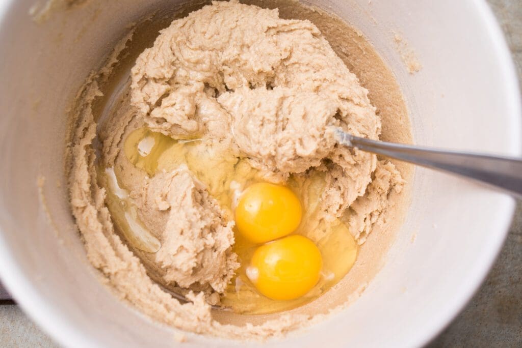 add the eggs to the cookie dough