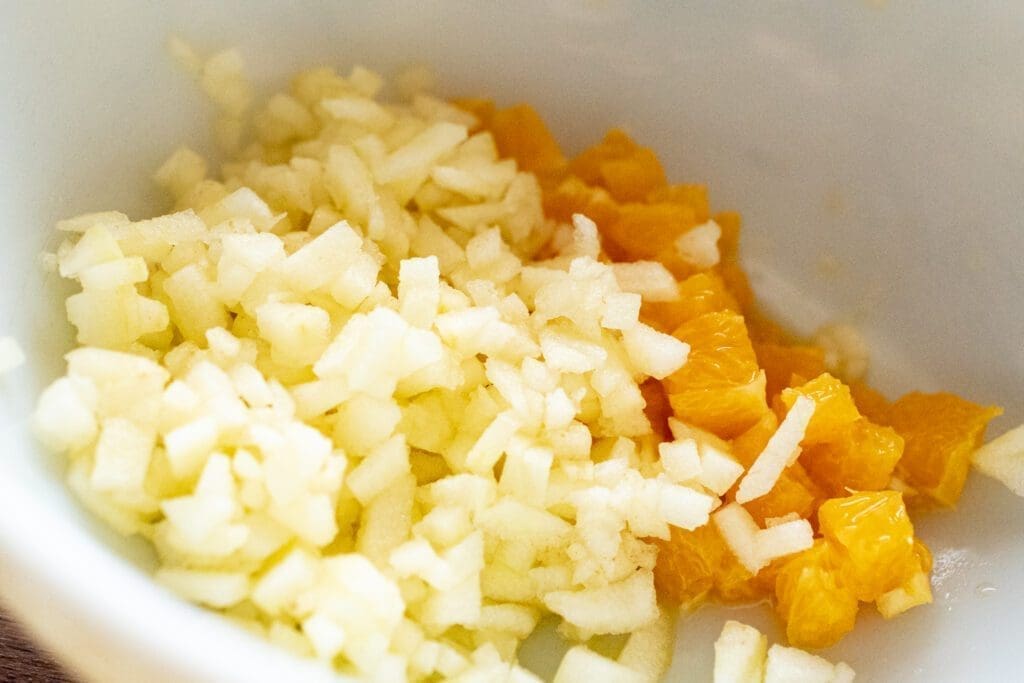 chopped apple and orange for relish