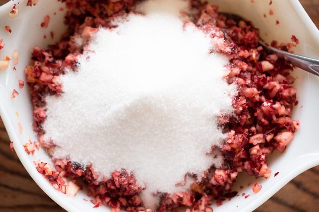 table sugar in chopped cranberry 