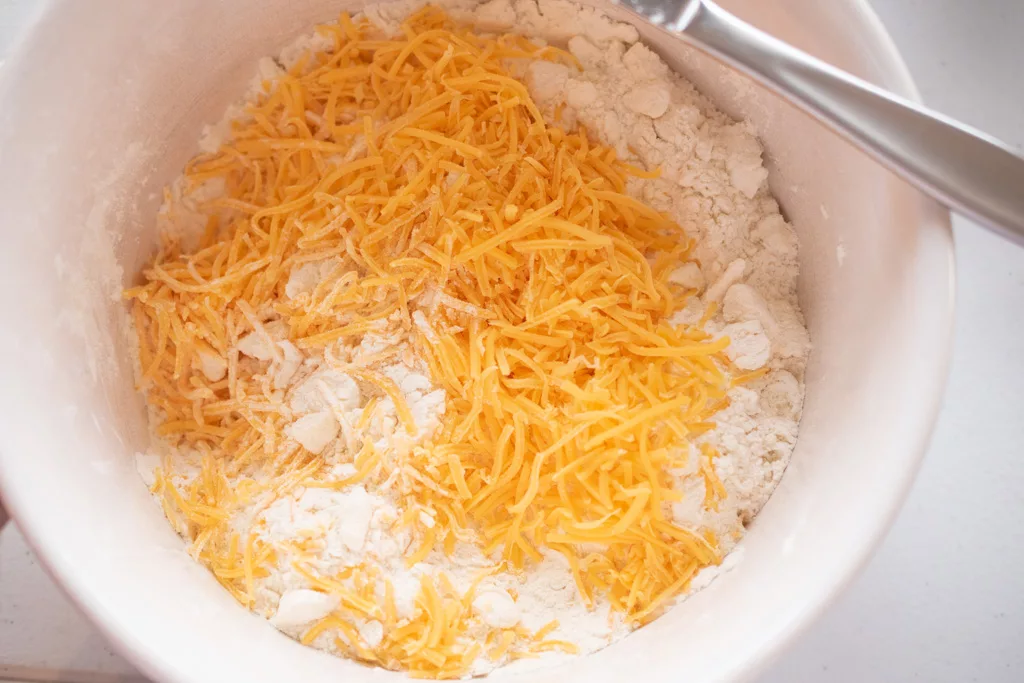 shredded cheddar cheese in biscuits