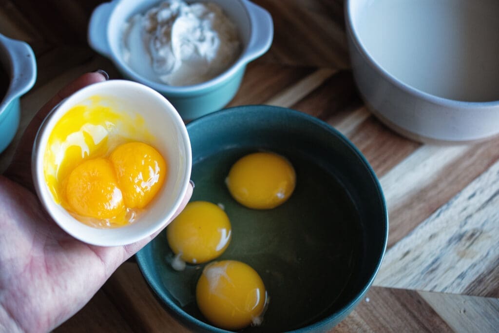 mixing eggs and egg yolks